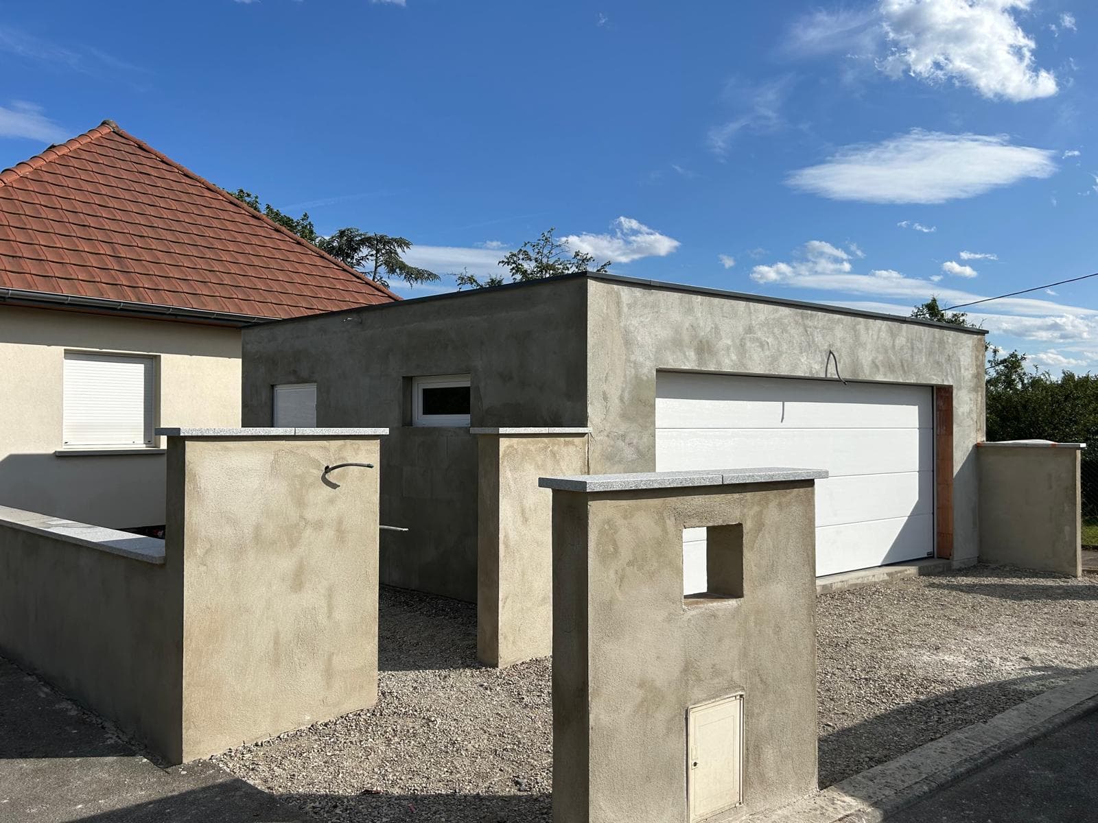 Construction d'un garage & mur en L